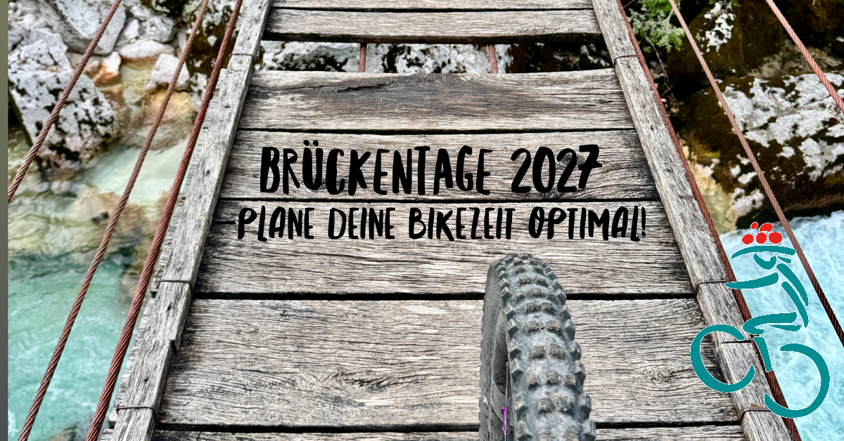 Mountainbikereifen auf Hängebrücke aus Holz über die Soca in Slowenien.